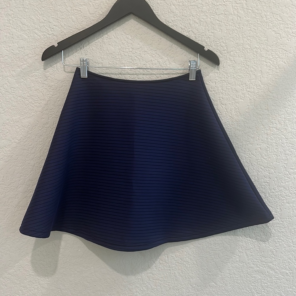 Mini Blue skirt by Miami in size Small
